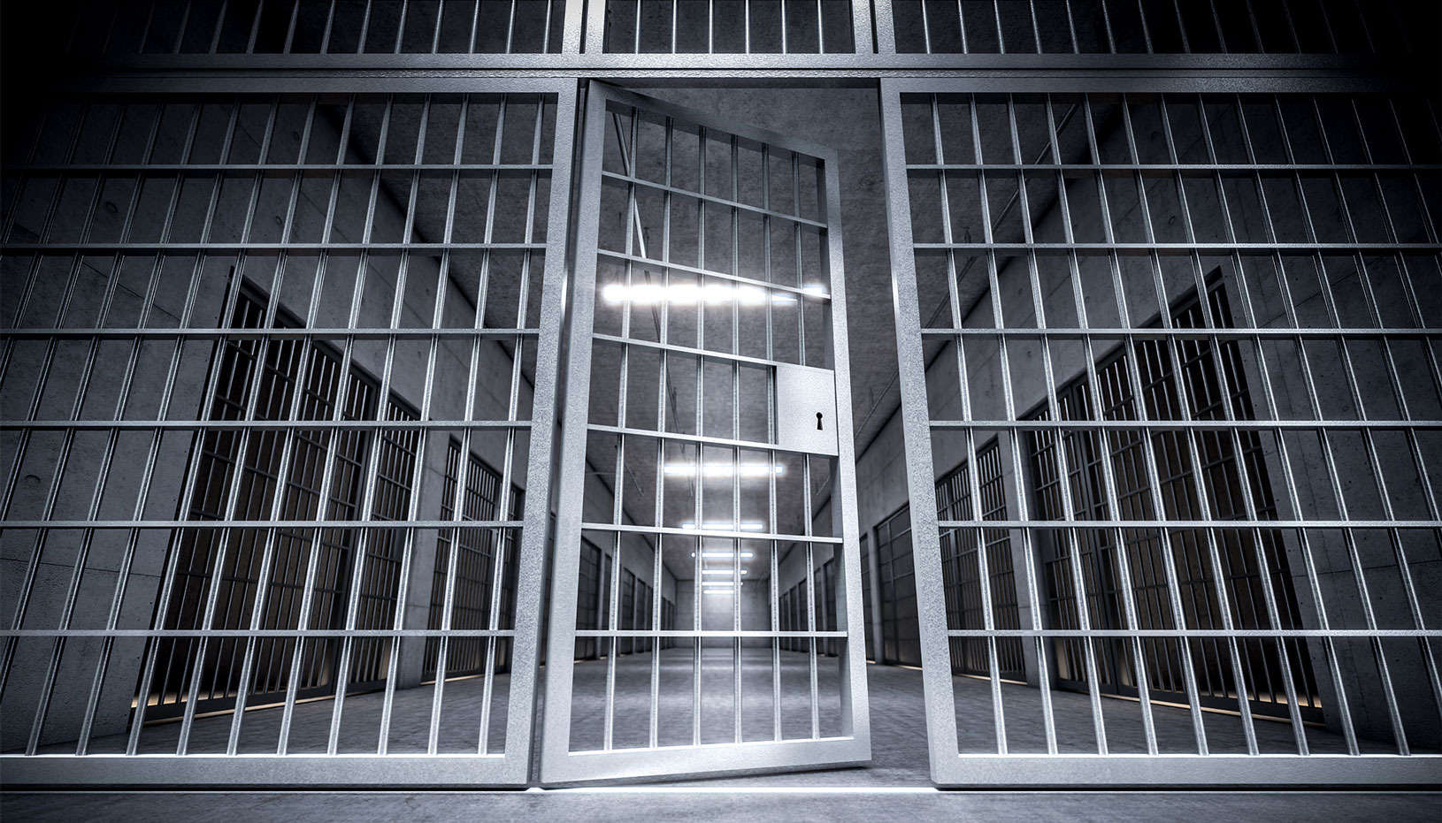 Black and White image of door to jail cells