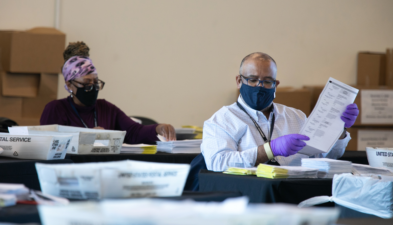 image of Georgia election officials counting ballots