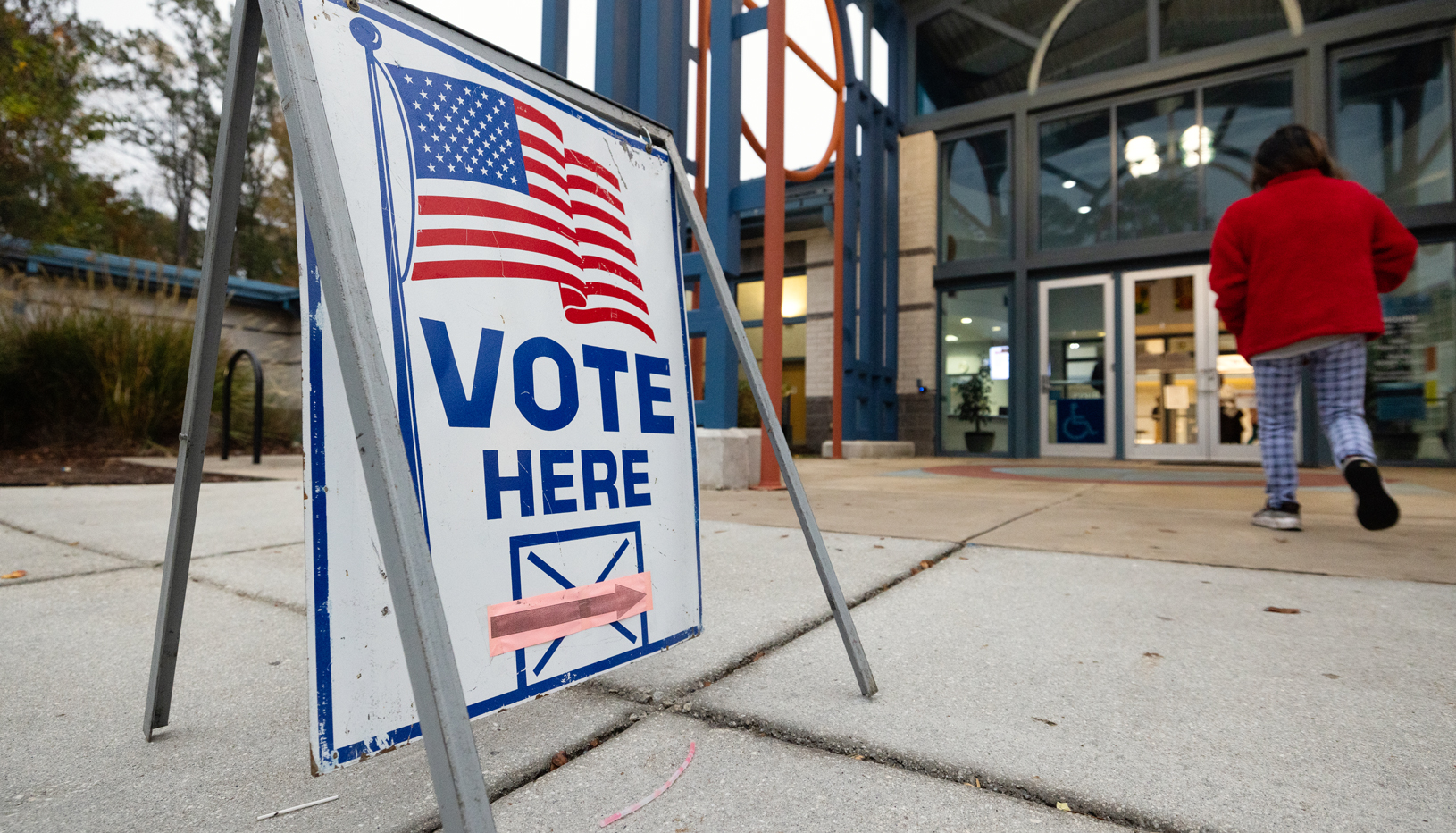 "Vote here" sign outside a polling place