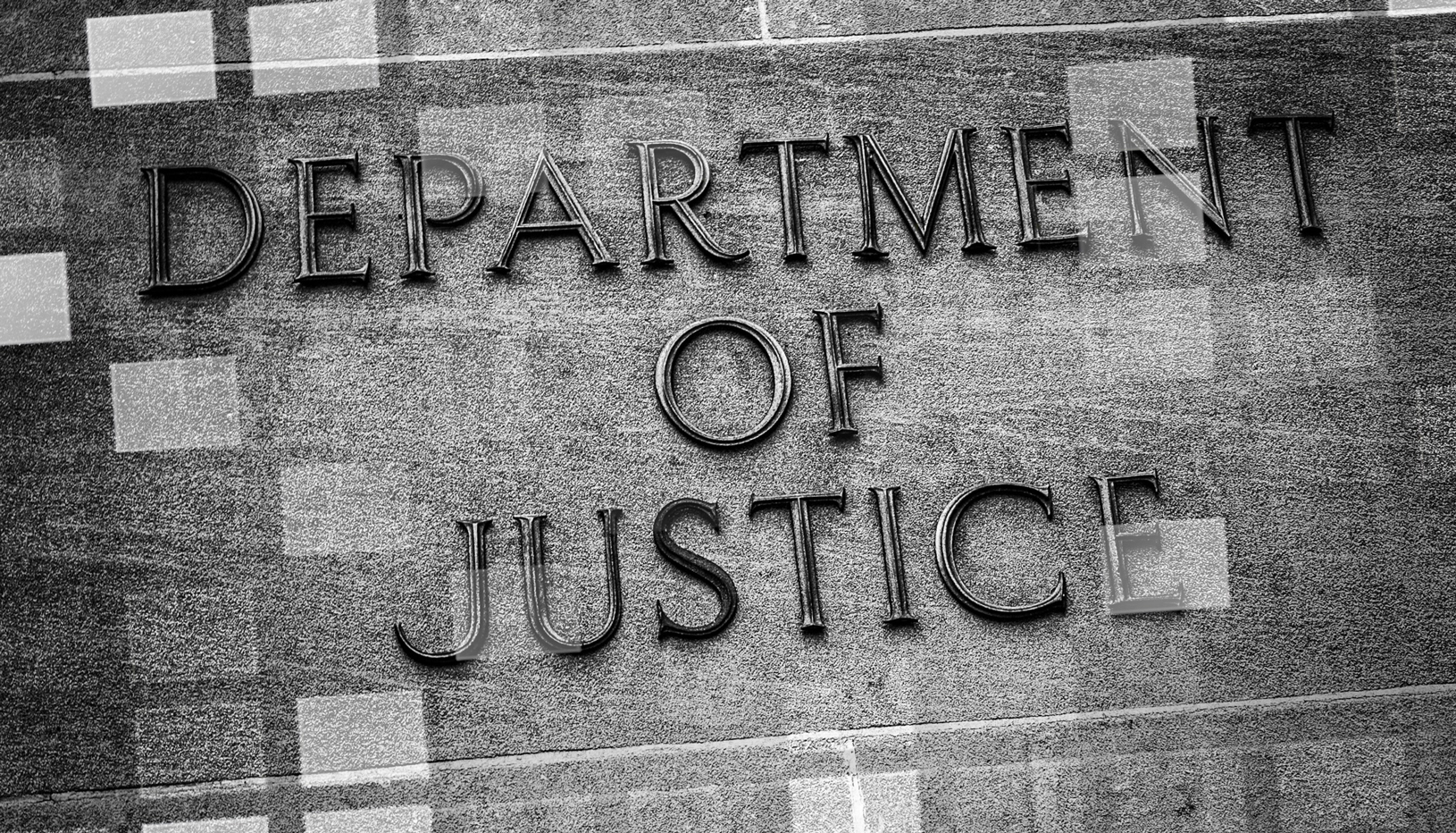 Department of Justice gray sign