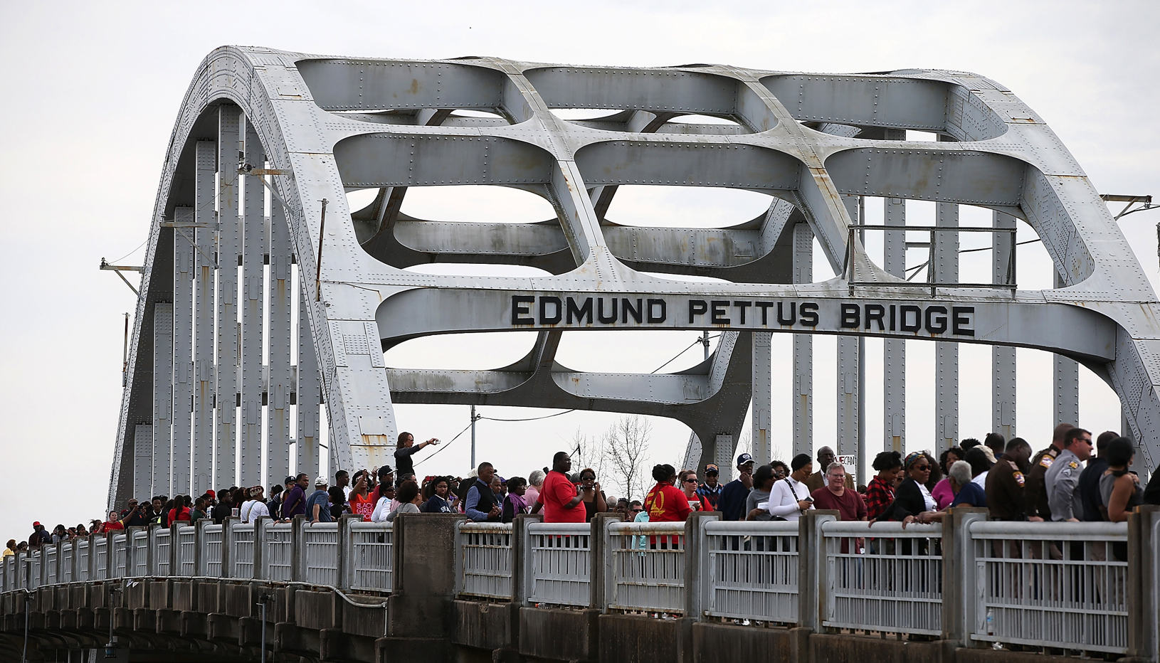 People marching on Edmund Pettus Bridge in Selma, AL