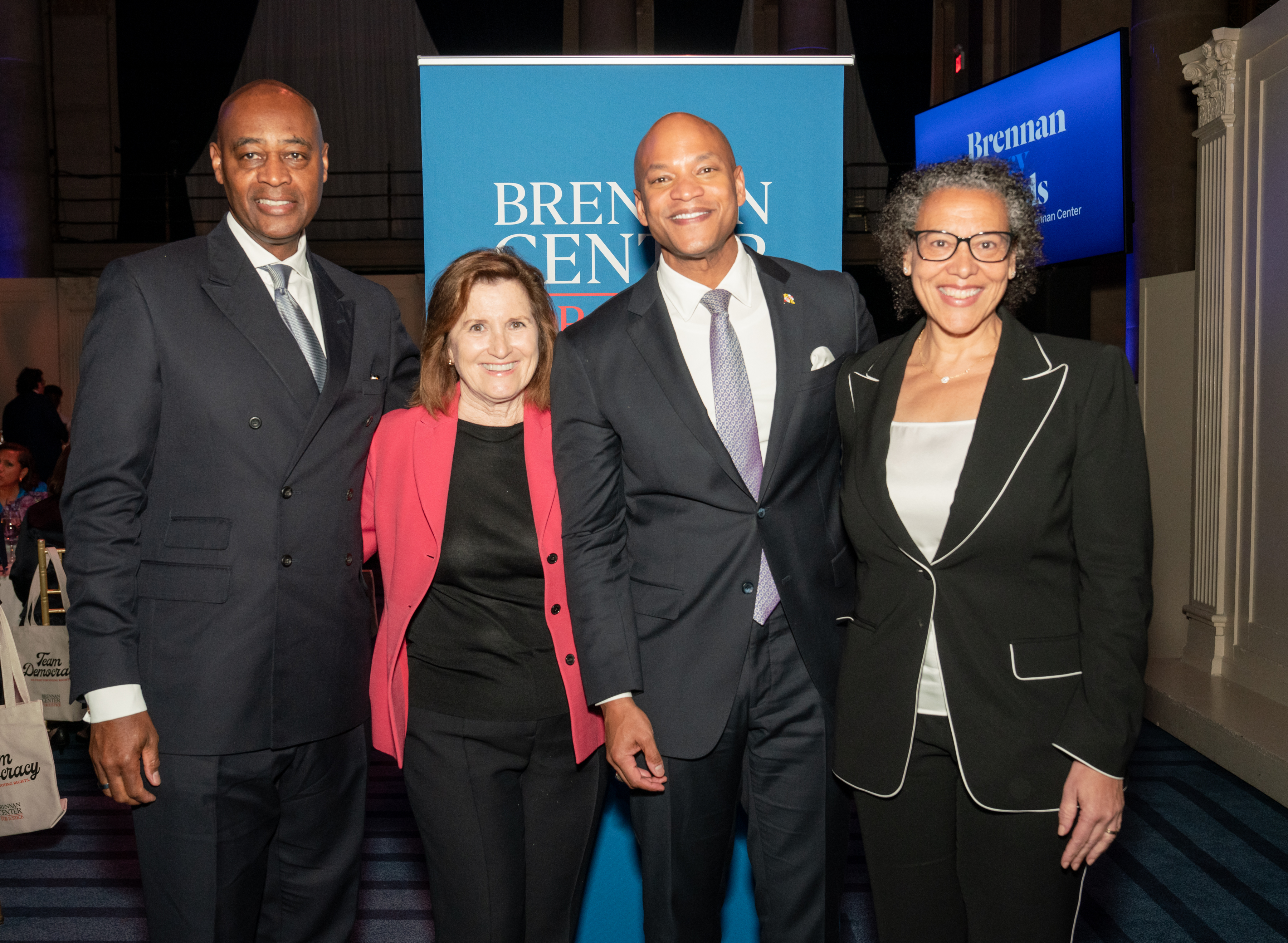 Gov. Moore (center right), Raymond J. McGuire (left), Christine Varney (center left) and Kimberley Harris (right)