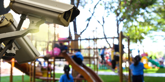 Surveillance camera near a playground