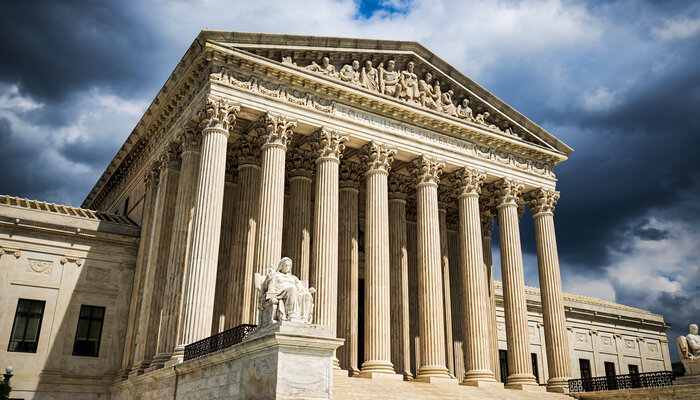 Supreme Court with dark clouds