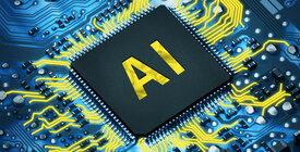 computer chip with AI written on it