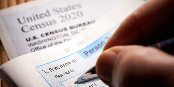 Person filling out census form